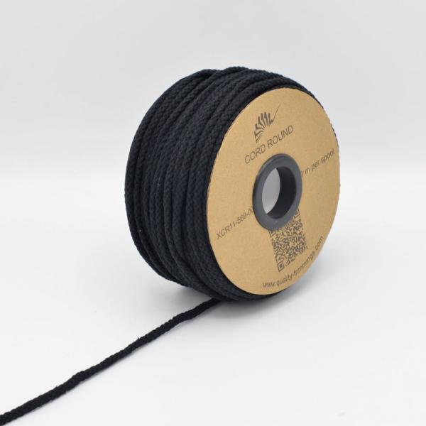 Kordel rund 6 mm in Schwarz, aufgerollt neben weiteren Farben der Reihe